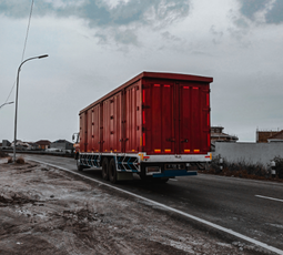Trailer truck with container on the road